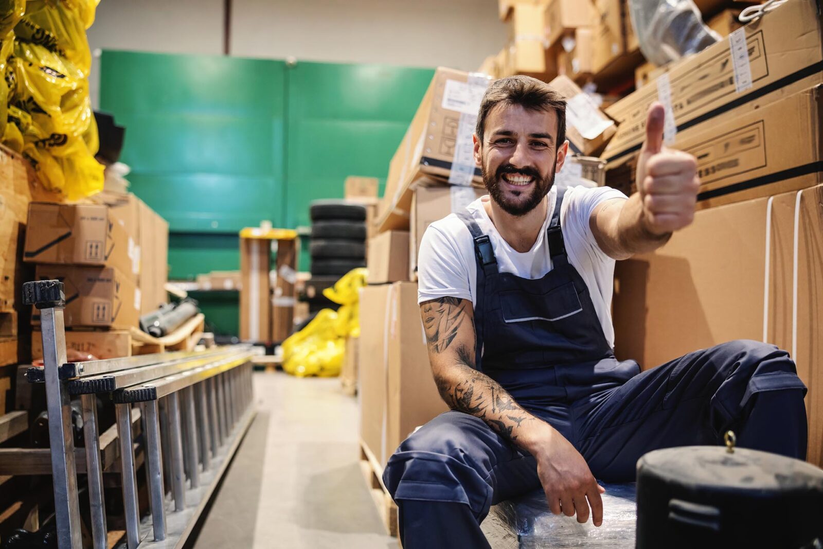 Smiling,Young,Hardworking,Tattooed,Bearded,Blue,Collar,Worker,In,Overalls