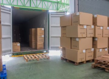 Loading,Shipment,Carton,Boxes,And,Goods,On,Wooden,Pallet,At